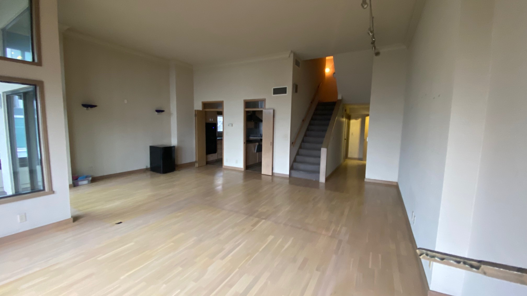 Living Room looking to stairs down from Entry